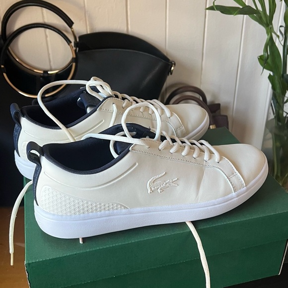 Like-new pair of Lacoste synthetic shoes. - Picture 1 of 3